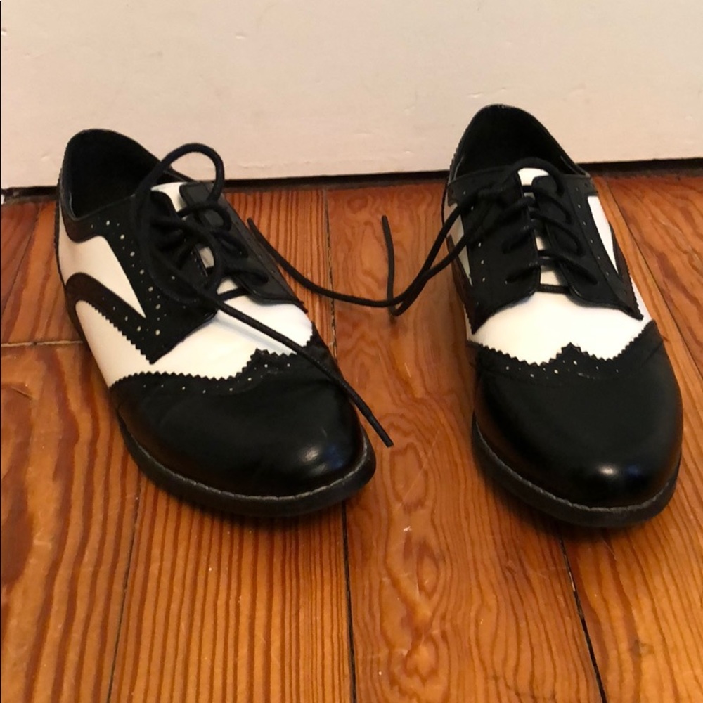 Black and white flat loafers